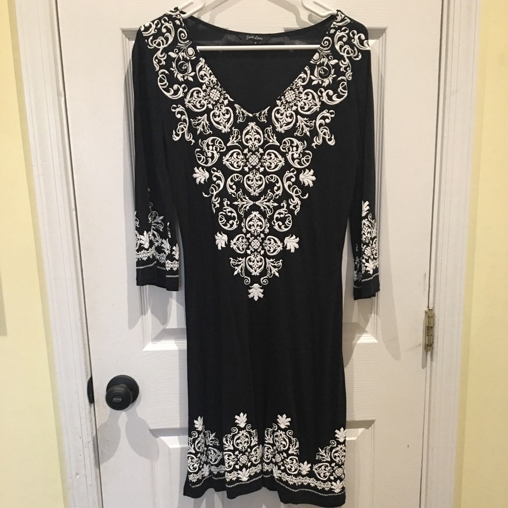 Black dress with white swirl design